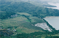 A coastal body of water in the lower part of a river valley that has been isolated from the sea by a sand spit or sand bar. 